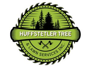 A logo for huffstetler tree and lawn services inc.