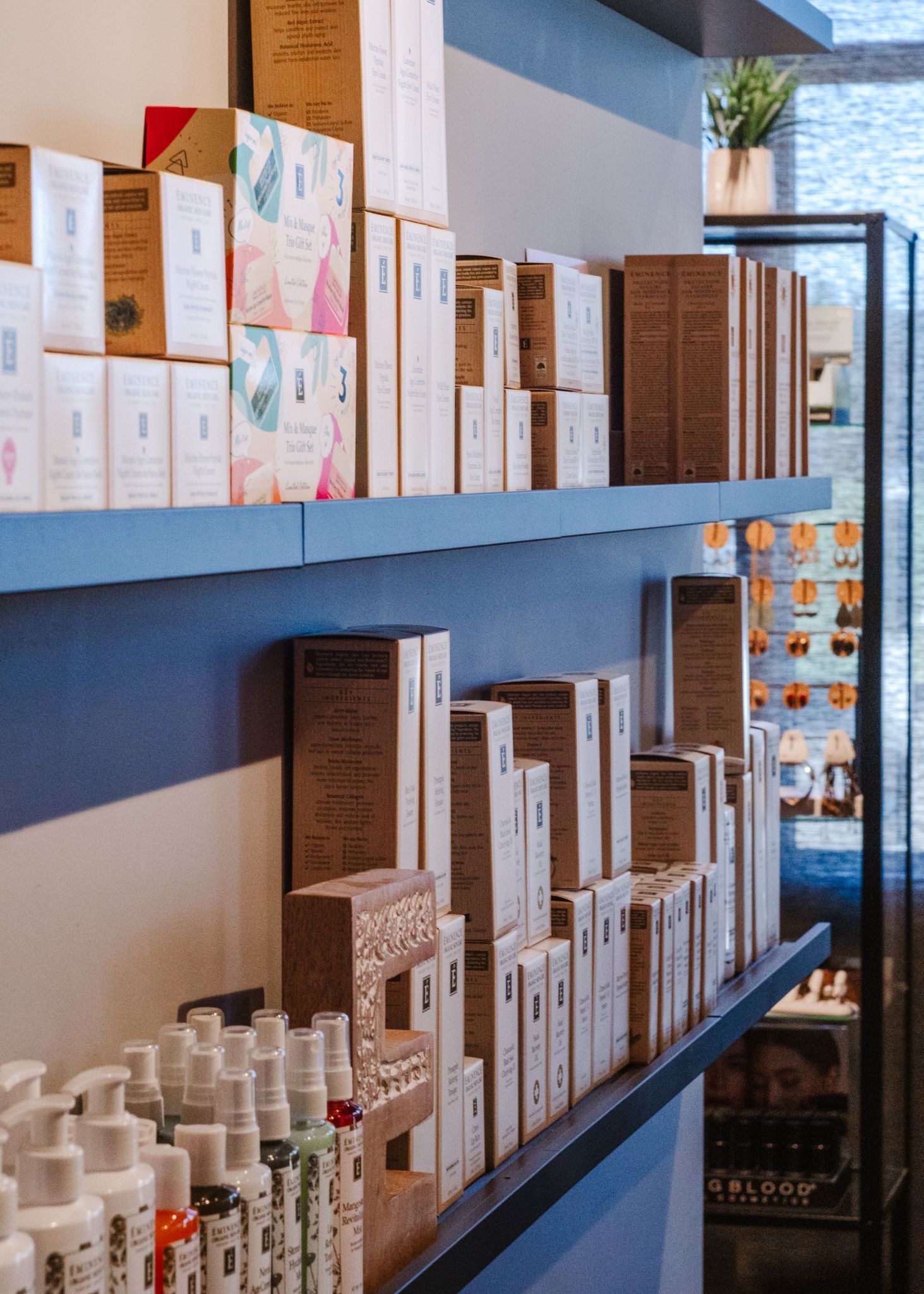 A store shelf filled with lots of boxes and bottles