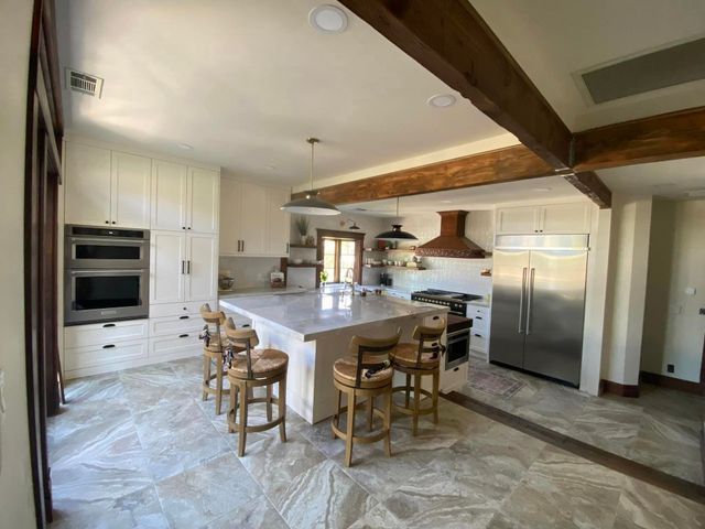 Highland kitchen remodeling featuring quartz countertops and improved storage