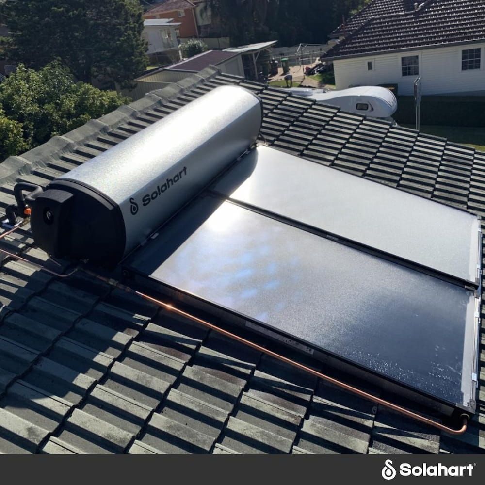 A Solar Water Heater Is On The Roof Of A House — David Lewis Solahart in Goonellabah, NSW