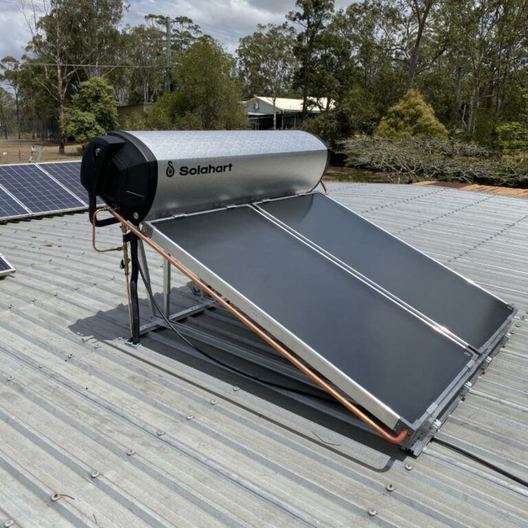 A Solar Water Heater Is Sitting On Top Of A Roof — David Lewis Solahart in Goonellabah, NSW