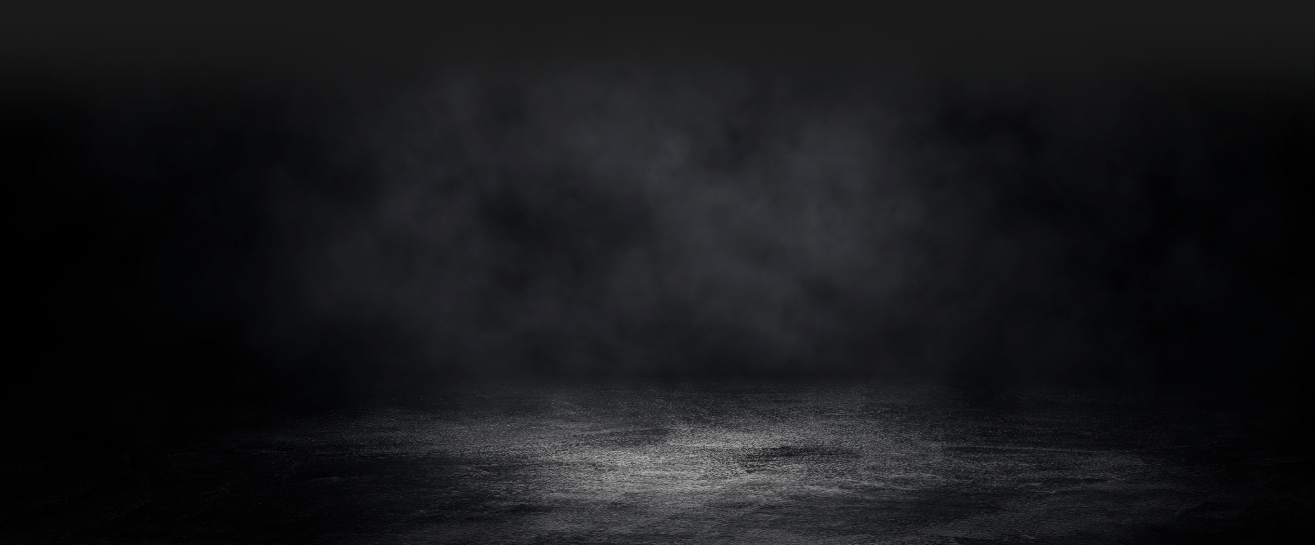 Dark, smoky background with a textured, wet-looking floor. | Lakeside Service Center