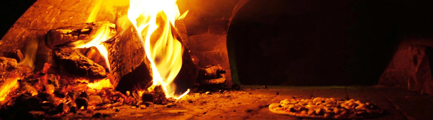 fire inside pizza oven