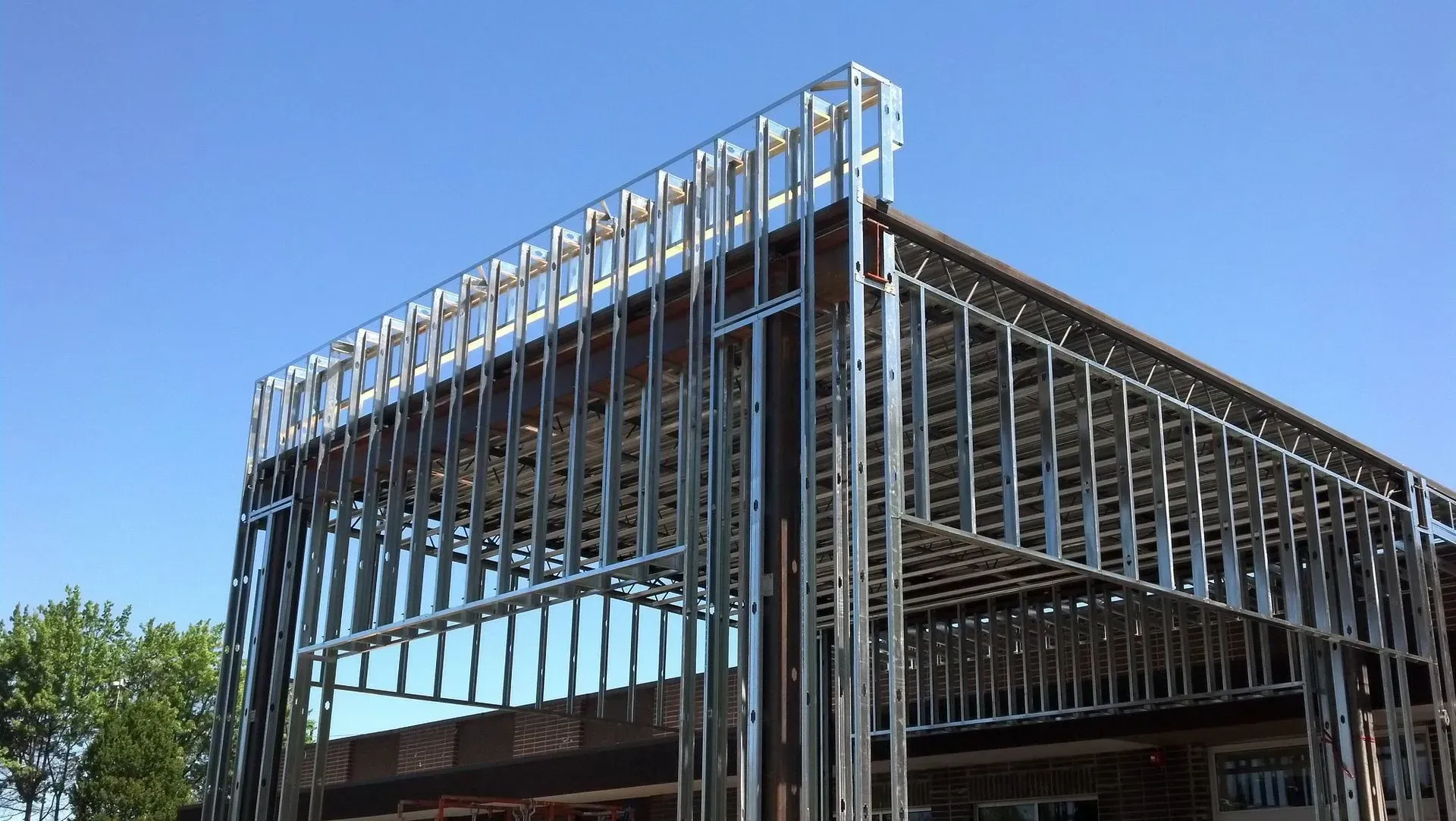 A building is being built with a lot of metal frames.