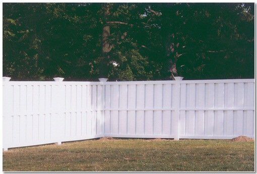 White Vinyl Fence in Residential Neighborhood — Green, OH — Big John Fence Company
