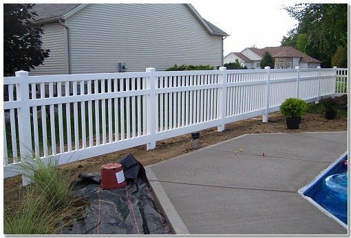 Shaded White Vinyl Fence — Green, OH — Big John Fence Company