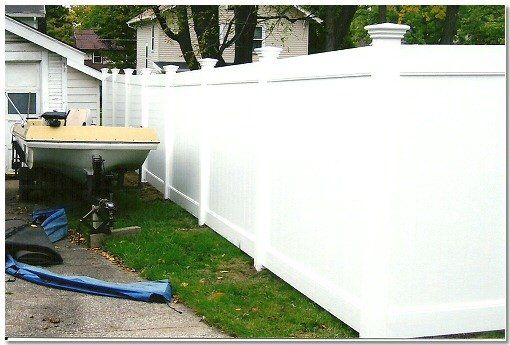 New White Vinyl Fence in Yard — Green, OH — Big John Fence Company