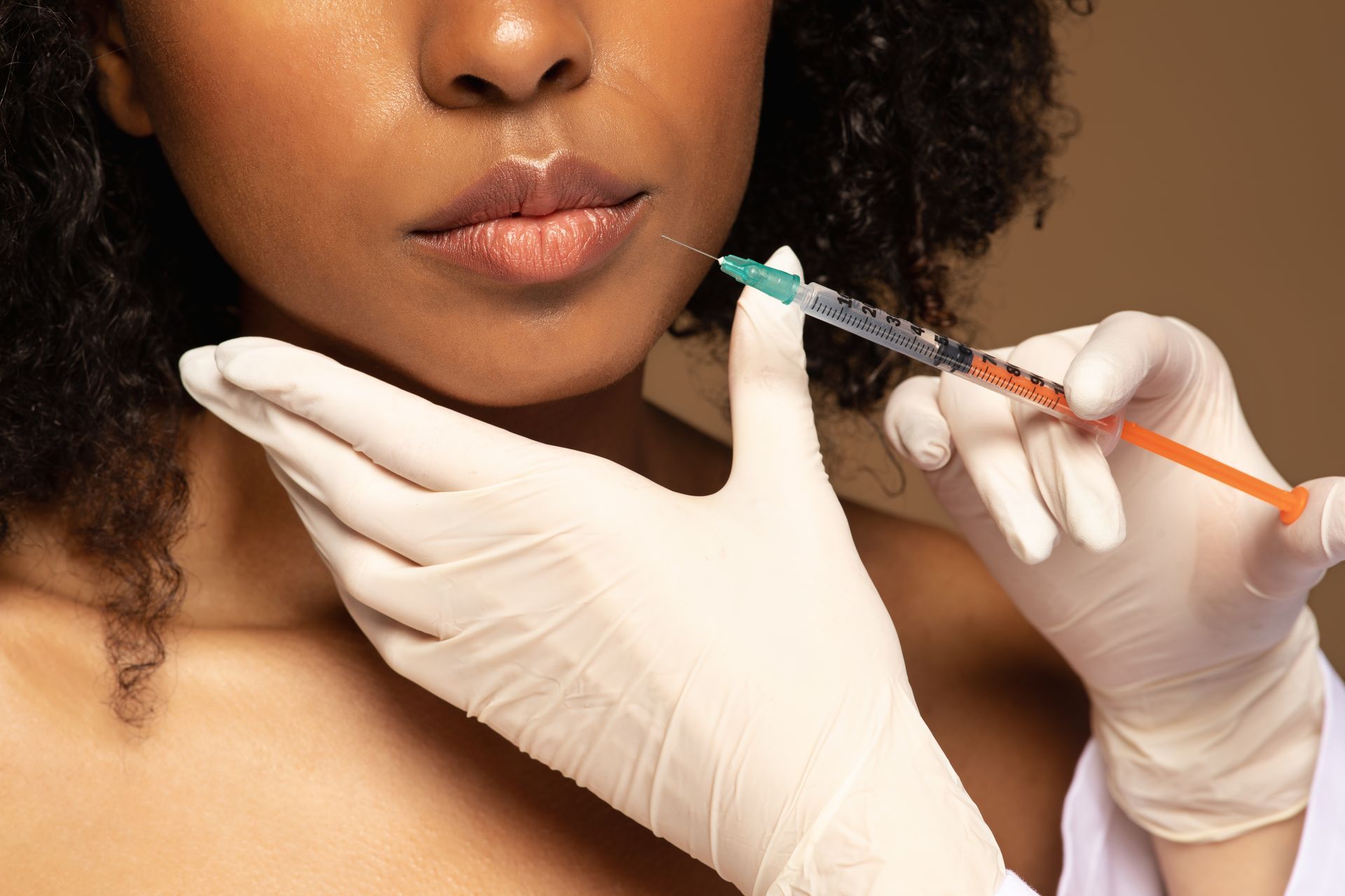 woman getting a lip filler treatment