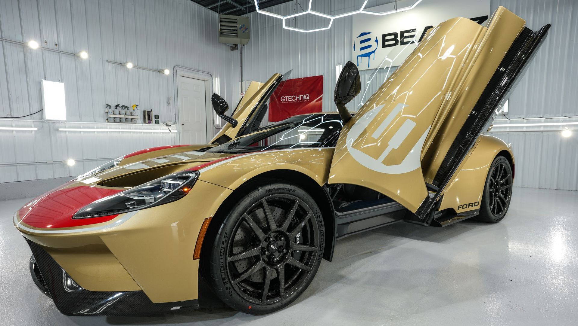 a car at an auto detailing for ceramic coating