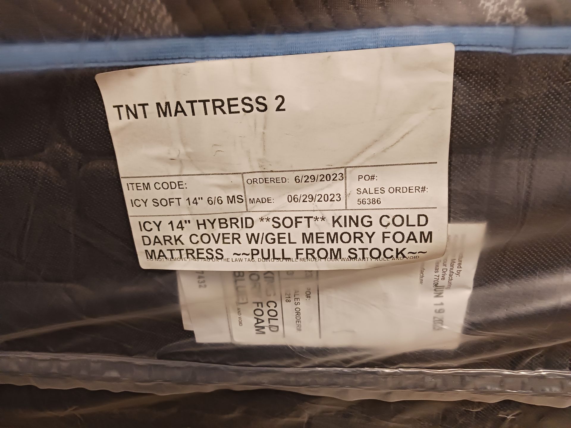 A mattress with a label that says tnt mattress 2
