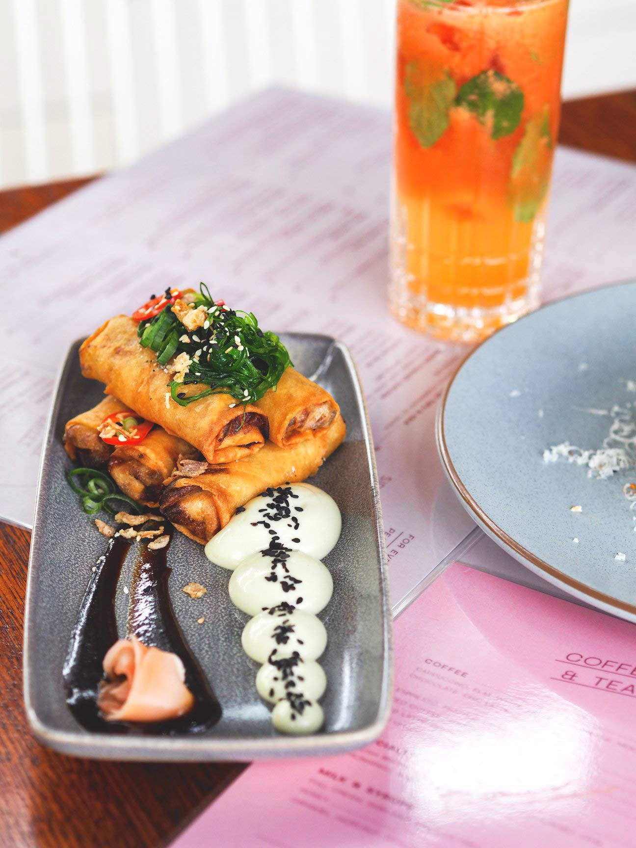 Spring Roll Dish And A Glass Of Fresh Juice — Cafe, Bar and Catering Services in Southport, QLD