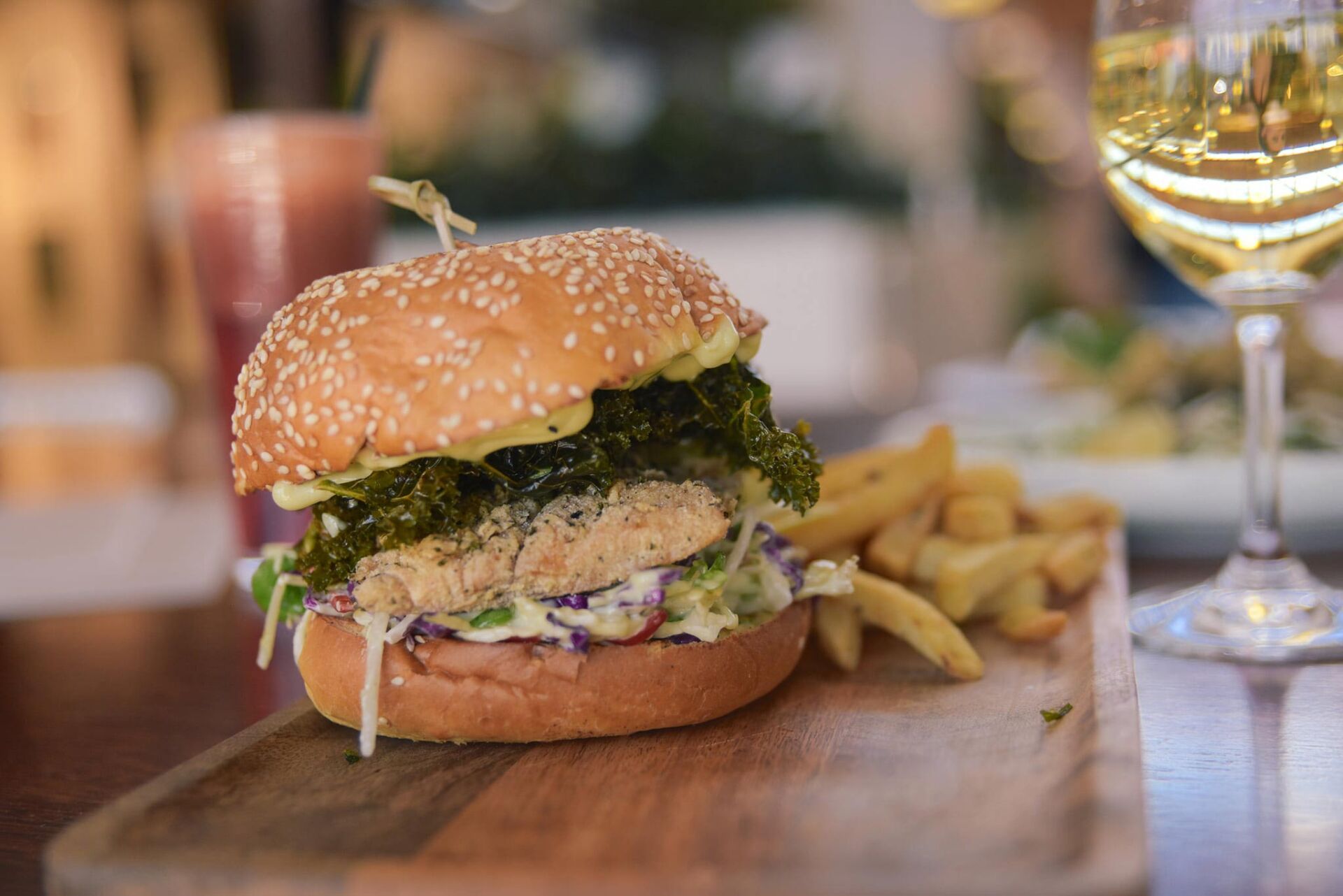 Nori-Seasoned Wild Flathead Burger With Wasabi Mayo Served With Fries — Cafe, Bar and Catering Services in Southport, QLD