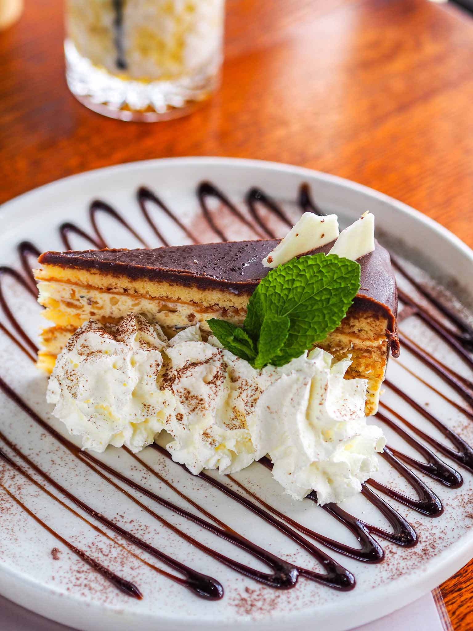 Slice of Cake with Cream — Cafe, Bar and Catering Services in Southport, QLD