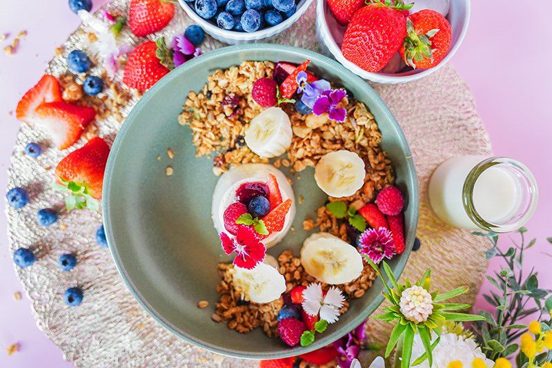 Bowl With Muesli and Fruit — Cafe, Bar and Catering Services in Southport, QLD