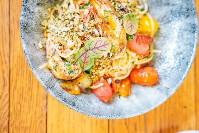 Prawn Linguine Dish With Tomatoes — Cafe, Bar and Catering Services in Southport, QLD
