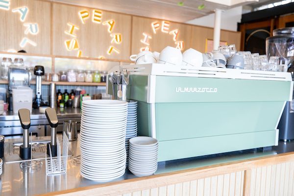 Plates And Cups On The Cafe Counter — Cafe, Bar and Catering Services in Southport, QLD