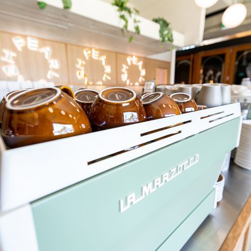 Brown Coffee Mugs — Cafe, Bar and Catering Services in Southport, QLD