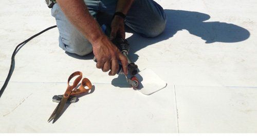 Roof — Contractor Fixing The Roof in Evansville, IN