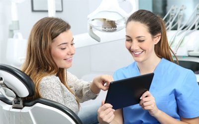 Family Dentistry — Dentist and Patient in Vacaville, CA