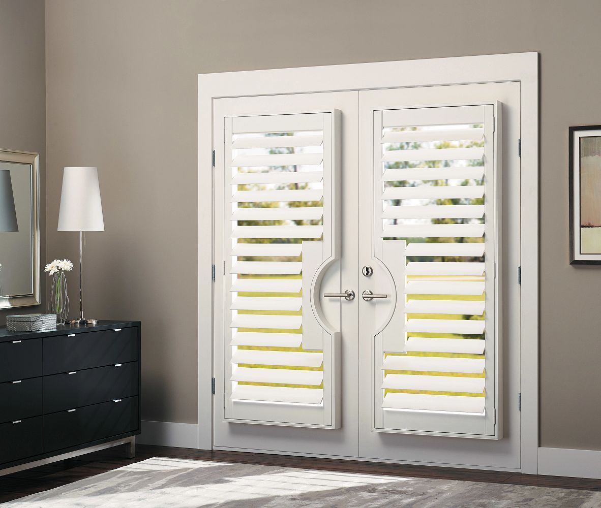 Doors with custom plantation shutters by Wall Decor and More.