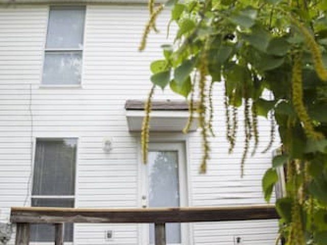 Exterior of Oak Crest Townhouses - white, two-story property