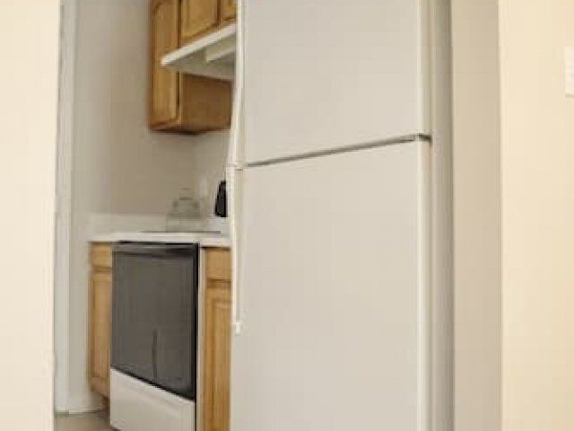 Kitchen with fridge and stove