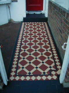 patterned floor tiling in a hallway