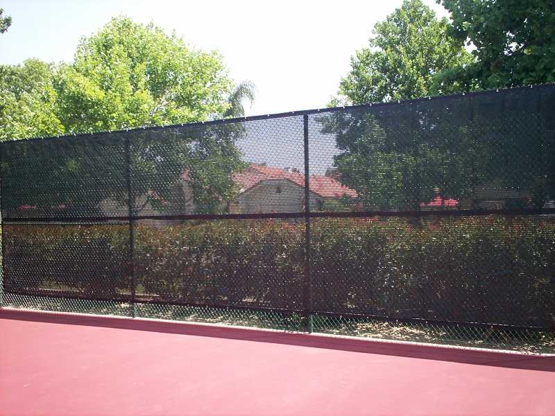 Chainlink fence with net — Wood Fences in Bakersfield, CA