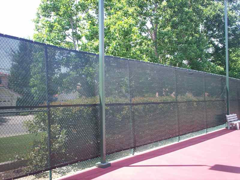 Chainlink fence covered with net — Wood Fences in Bakersfield, CA