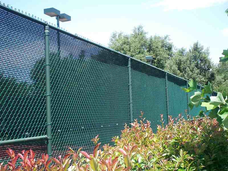 View of chainlink fence in tennis court — Wood Fences in Bakersfield, CA