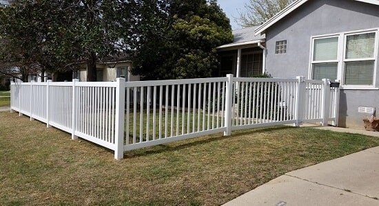 Beautiful house with wood fence gate — Wood Fences in Bakersfield, CA