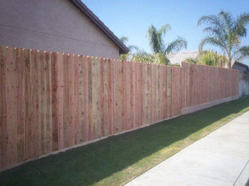 Wood fences in grass — Wood Fences in Bakersfield, CA