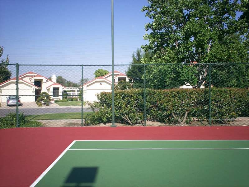 Tennis court with chainlink fence — Wood Fences in Bakersfield, CA
