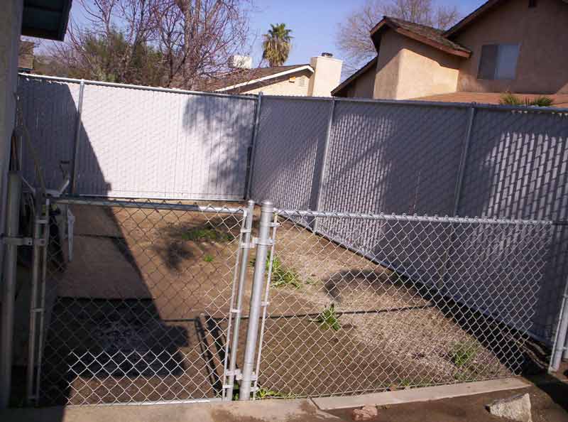 Chainlink fence inside the house — Wood Fences in Bakersfield, CA
