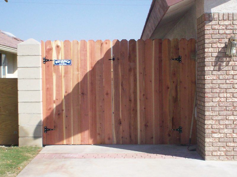 House gate made out of wood fence— Wood Fences in Bakersfield, CA