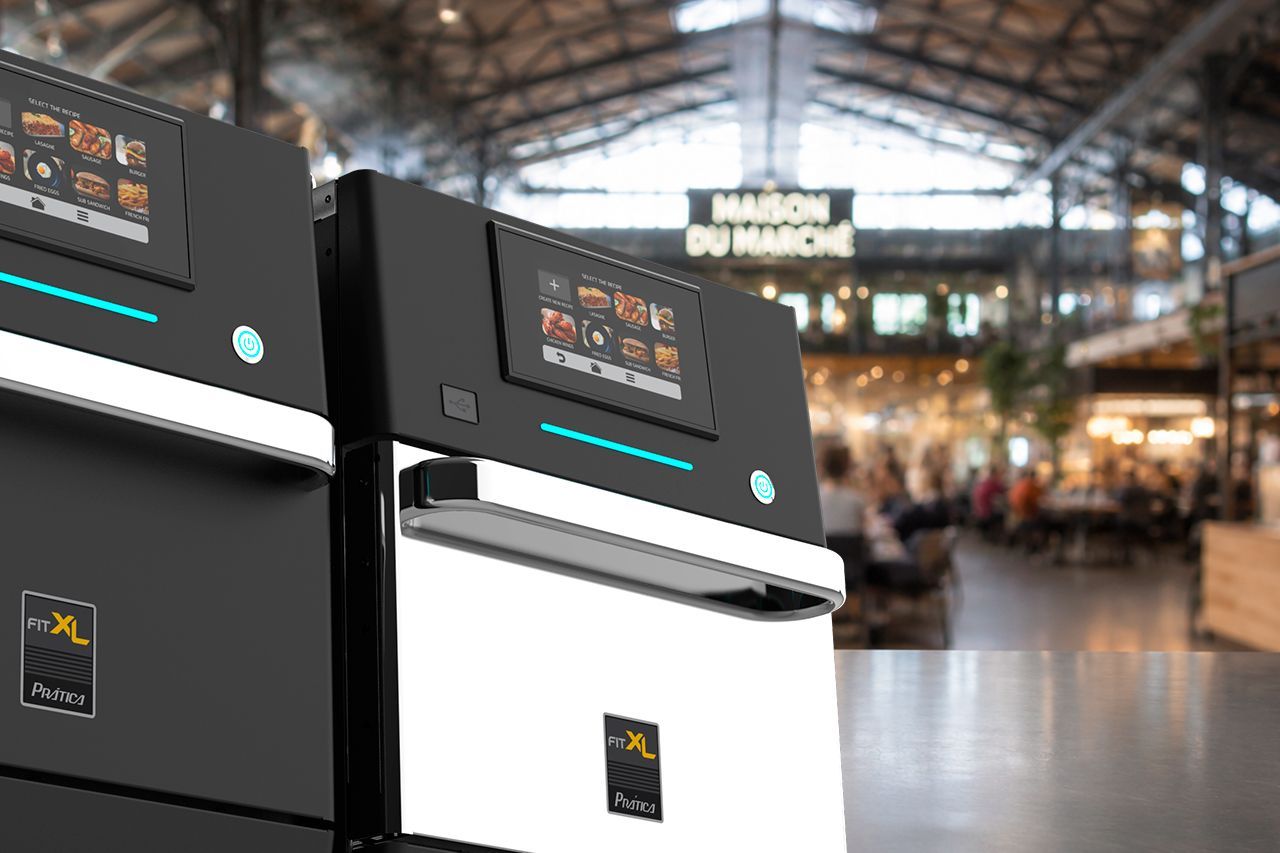 Two Prática FIT XL Speed Ovens installed in a modern food hall