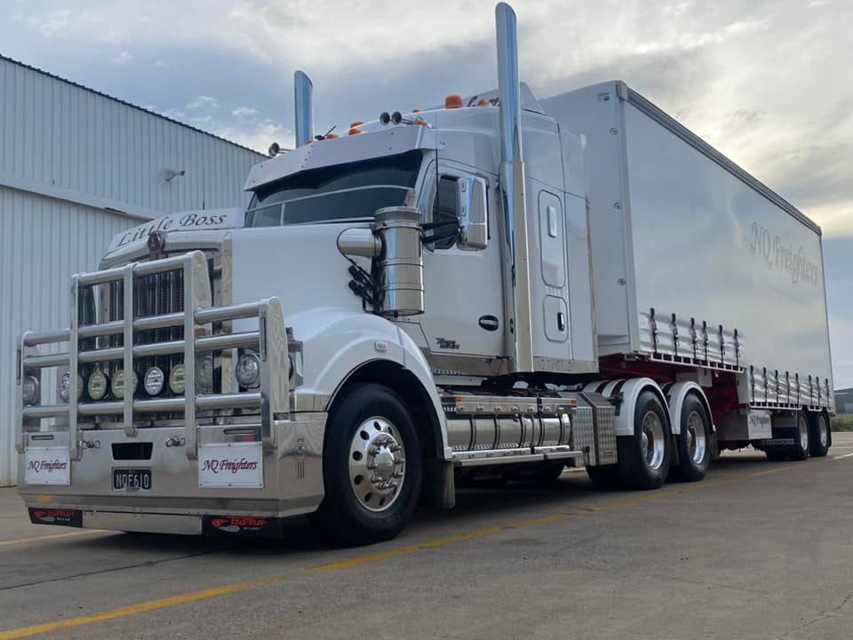 Little Boss In Front Of The White Container Truck — NQ Freighters In Bohle QLD