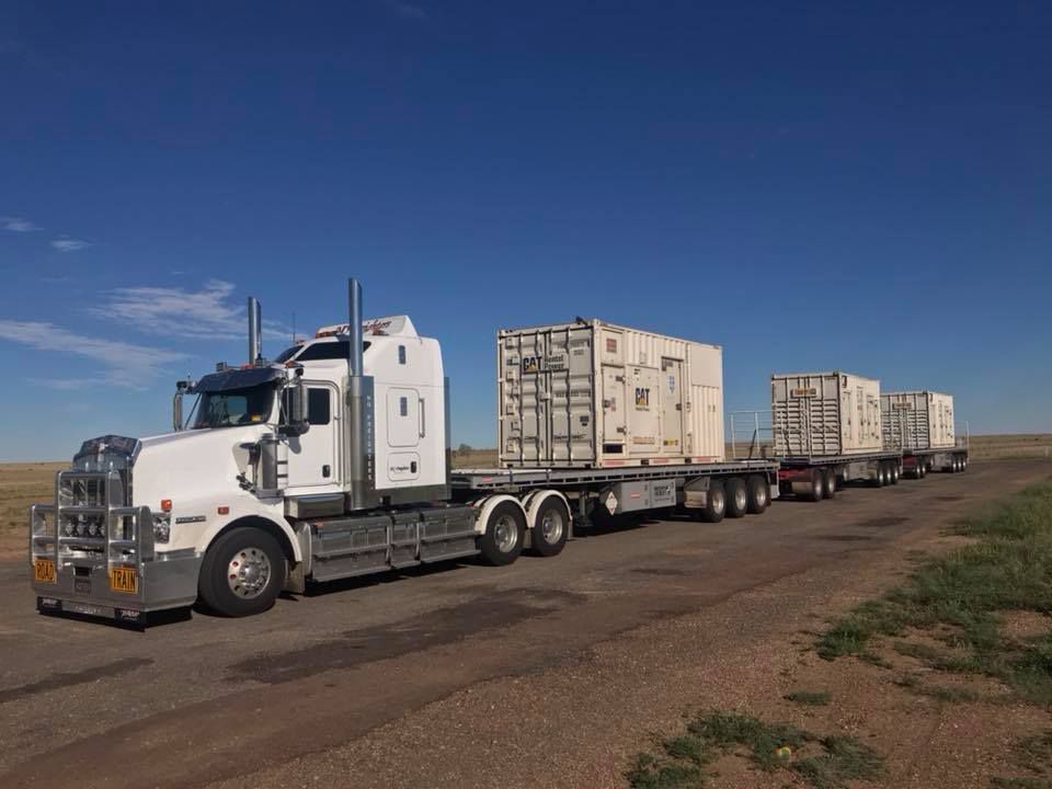 Transporting The Three Containers On The Trailers — NQ Freighters In Brisbane QLD