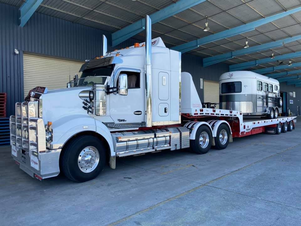 White Truck Transport The Camper Trailer — NQ Freighters In Townsville QLD
