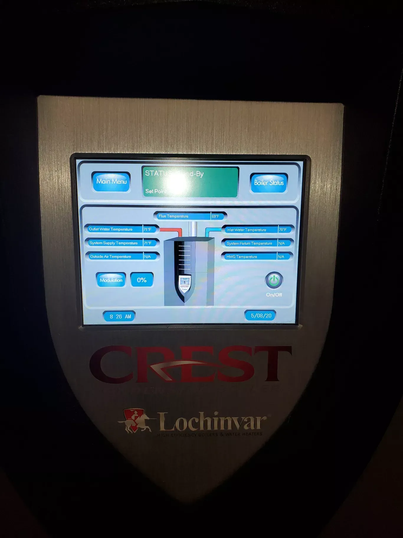 A crest device is displayed on a black background