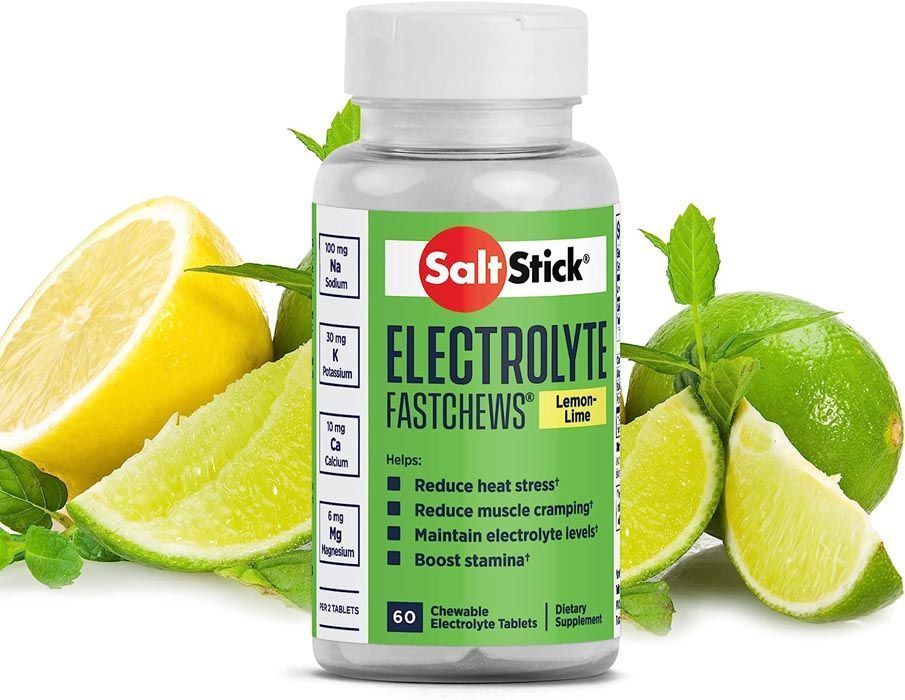 SaltStick electrolyte chewable tablets bottle with lemon and lime fruit.