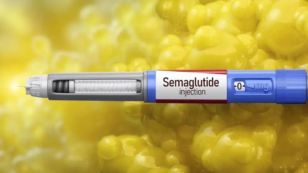 Semaglutide injection pen on a yellow gel-like background