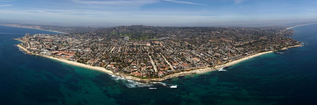 An aerial view of a small island in the middle of the ocean.