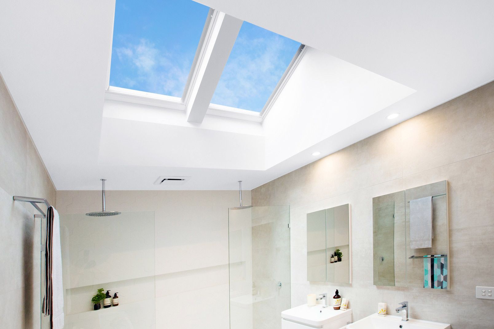 Bathroom Interior With Two Skylights Showing Blue Sky — Gold Coast Skylights in Slacks Creek, QLD