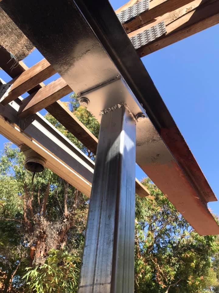 Looking Up at a Metal Structure With Trees in the Background — Jensen Welding & Fabrication in Chevallum, QLD