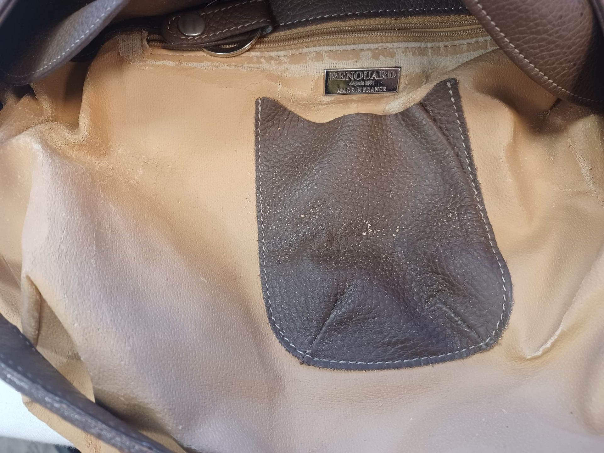 Retouche / réparation d'un sac à main