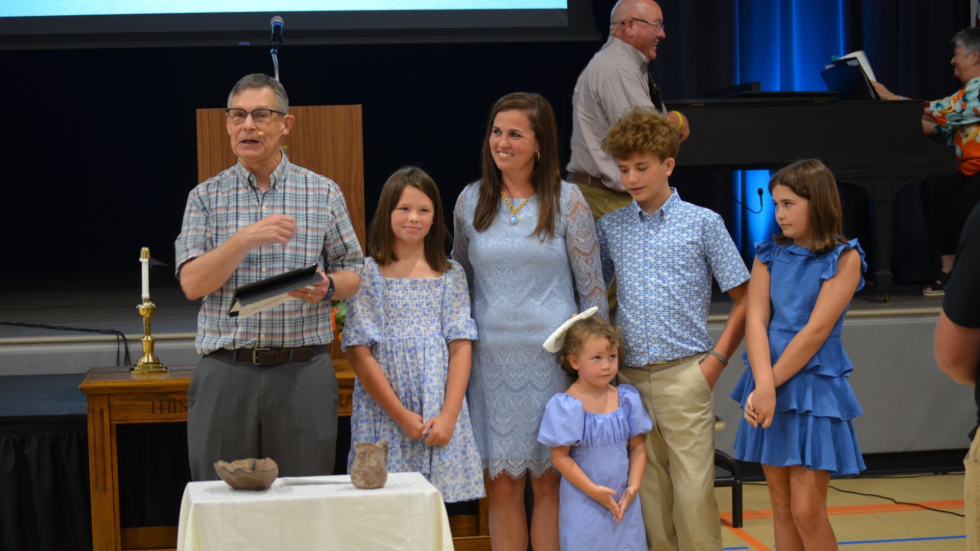 Pastor Bob Rambo weclomes new members.