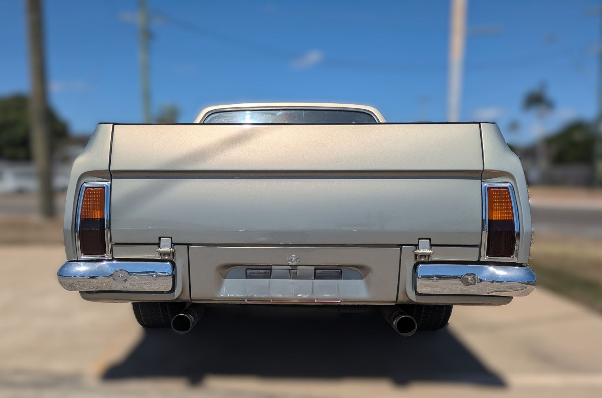 Rear View of a Beige Classic Car — Aitkenvale Exhausts & Towbars Pty Ltd In Aitkenvale, QLD