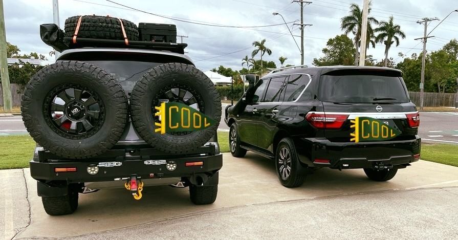 Two Black SUVs Parked — Aitkenvale Exhausts & Towbars Pty Ltd In Aitkenvale, QLD
