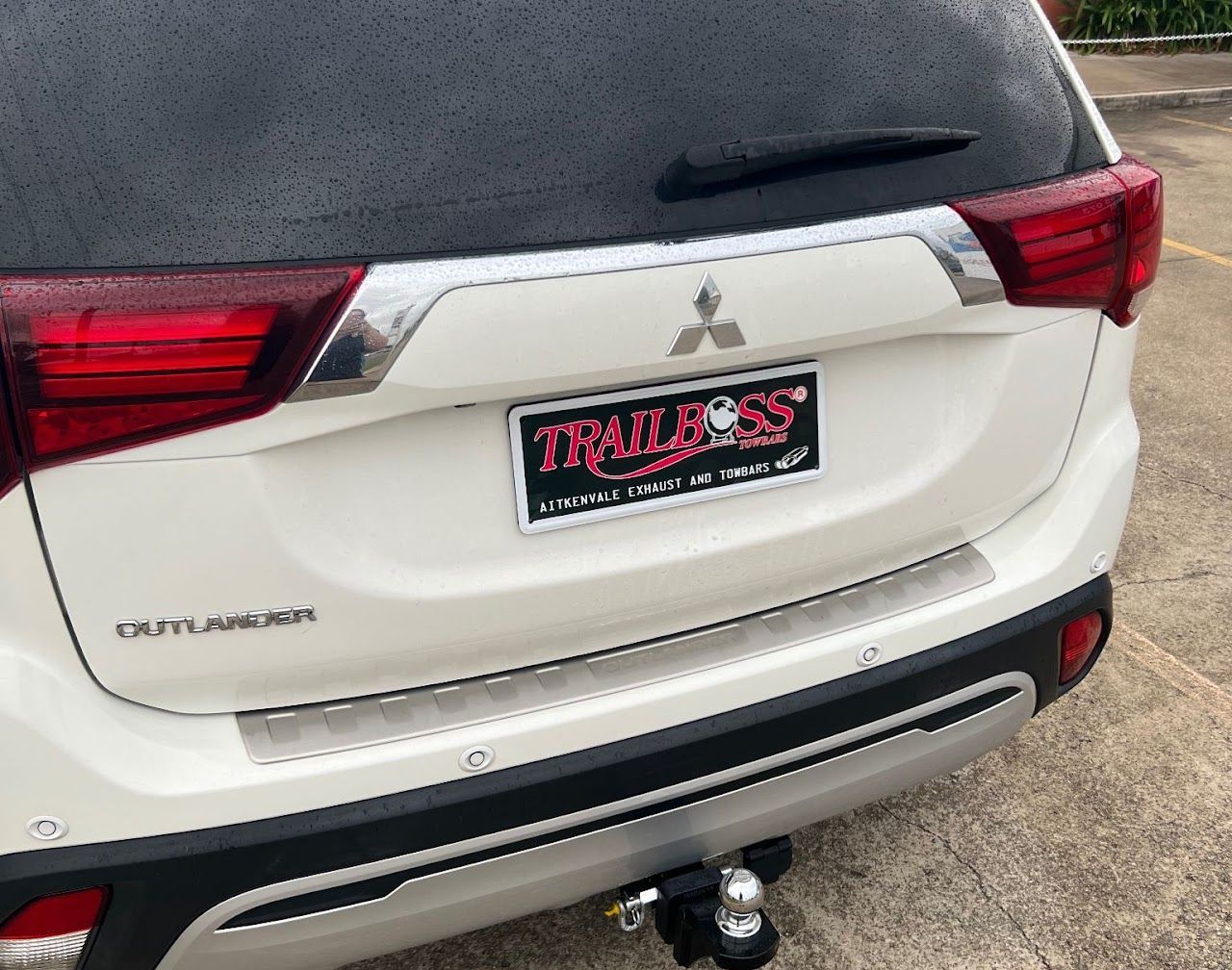 White Mitsubishi Suv Rear — Aitkenvale Exhausts & Towbars Pty Ltd In Aitkenvale, QLD